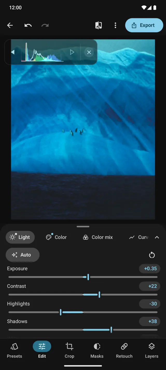 Edit: the Light panel with exposure, contrast, highlights and shadows sliders over a blue iceberg, with a live histogram.