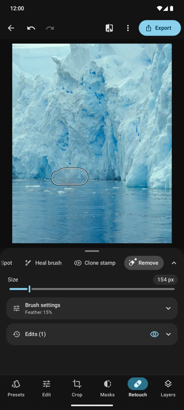 Retouch: a boat removed from in front of a glacier with the Remove tool.